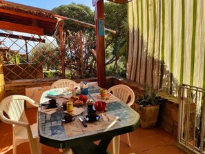 Apartment, 1 Bedroom, Patio, Garden View | Outdoor dining - Well-designed Apartment in Stintino (Stintino)