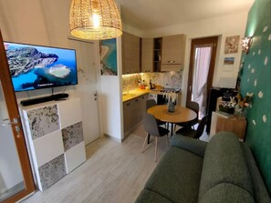 Apartment, 1 Bedroom, Patio, Garden View | Living room - Well-designed Apartment in Stintino (Stintino)