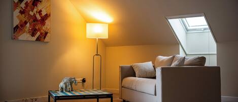 Habitación doble Deluxe, vista al valle | Área de sala de estar