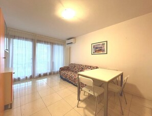Apartment, 1 Bedroom, Garden View | Living room - Bright and Spacious Vacation Home in Grado (Grado)