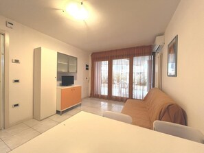 Apartment, 1 Bedroom, Garden View | Living room - Functional Apartment With a Spacious Fenced Garden (Grado)