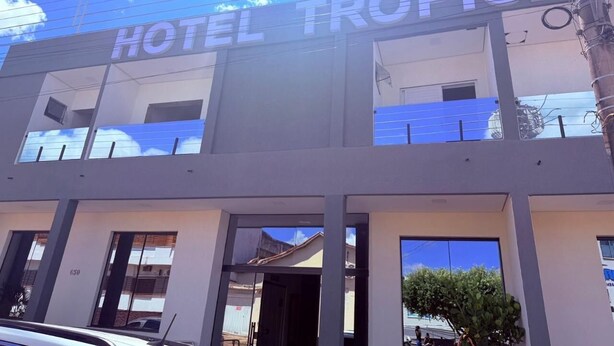 A modern hotel building with the name 'HOTEL TROPICA' prominently displayed. - Hotéis Tropical Aquidauana (Aquidauana)