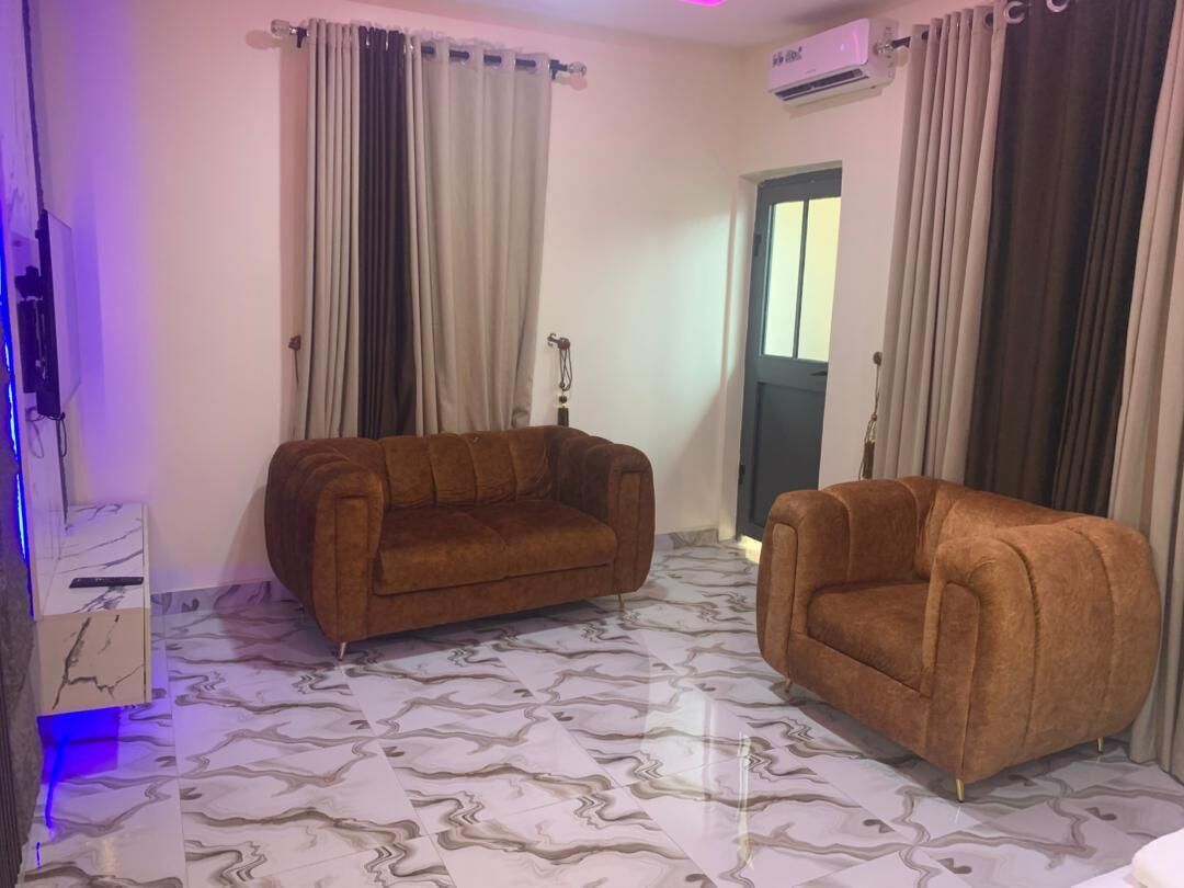 Suite Élite, climatisation, vue ville | Coin séjour