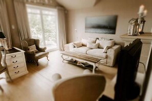 Luxury Penthouse, Balcony, Lake View | Living area - Heikendorf Ostsee Strandhotel mit Sauna (Heikendorf)