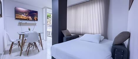 Apartment | Blackout drapes, iron/ironing board