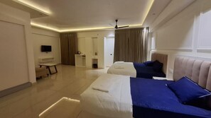 Family Room, Garden View | Desk, laptop workspace, free WiFi - aagneyam grand RESORT (Kozhikode)