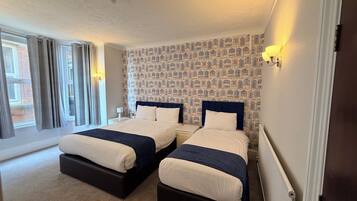 Standard Family 3 Room | Desk, blackout curtains, iron/ironing board, free WiFi