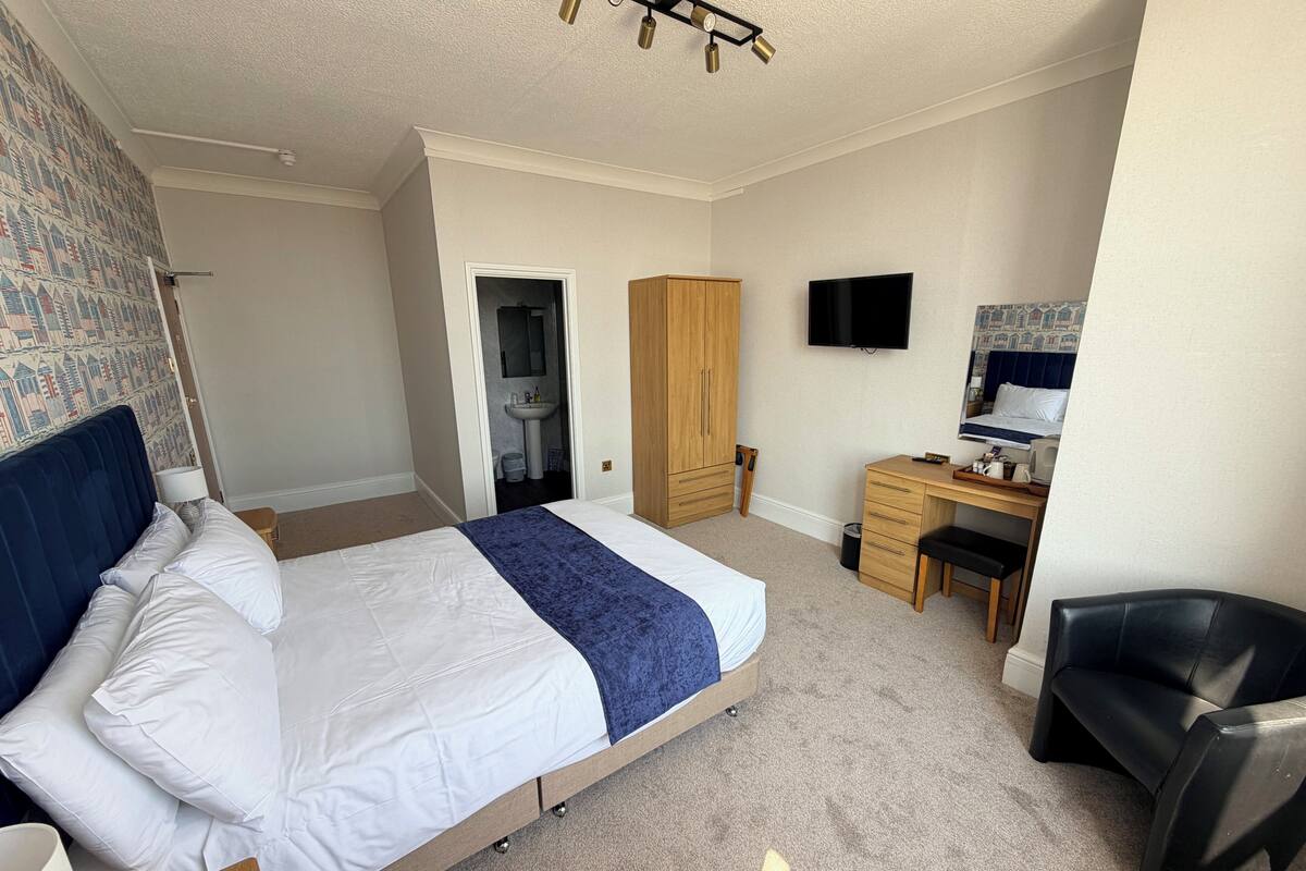 Desk, blackout drapes, iron/ironing board, free WiFi