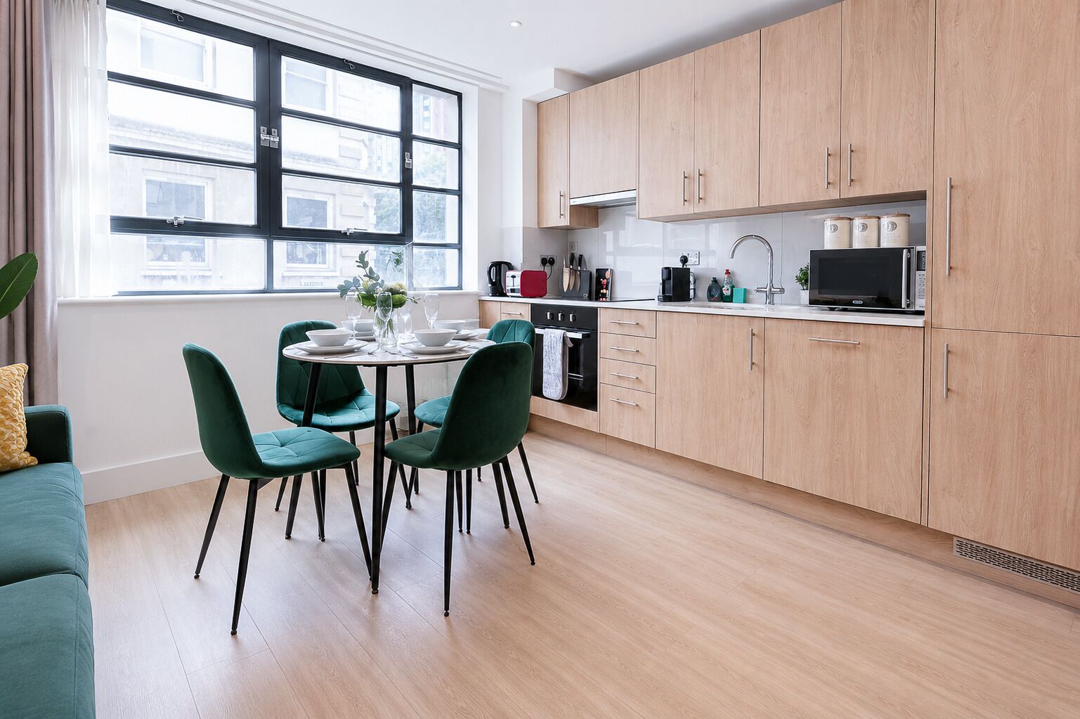 Fridge, stovetop, dishwasher, coffee/tea maker