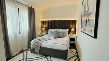 3 habitaciones, tabla de planchar con plancha, wifi y ropa de cama