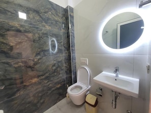Habitación Deluxe doble | Baño | Toallas