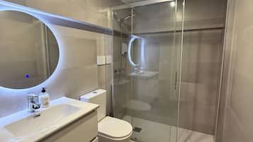 Shower, towels, soap, shampoo