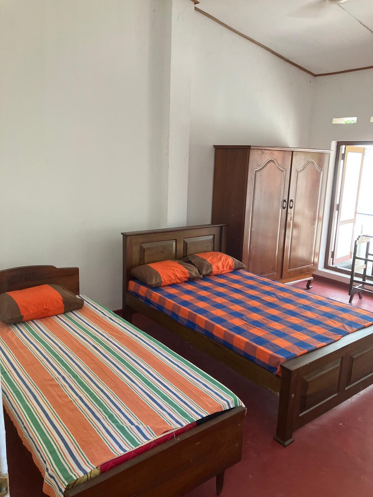 Economy House | Desk, iron/ironing board, bed sheets