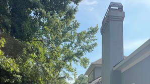 A residential property with a wooden deck, a brick pathway, and a well-maintained lawn. - Abbeys at  WestLake , Wonderful 3-bedroom house with AC in charming Martinez. (Martinez)
