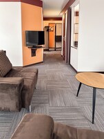 Habitación triple familiar | Zona de estar