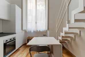 Dining - GuestHost - Modern mezzanine studio apartment of 35 m2, ideal for two people, located on the raised ground floor of a typical Milanese building (stairs to access the apartment).The property is located a stone's throw from the M1 Lima stop in a strategi (Milan)
