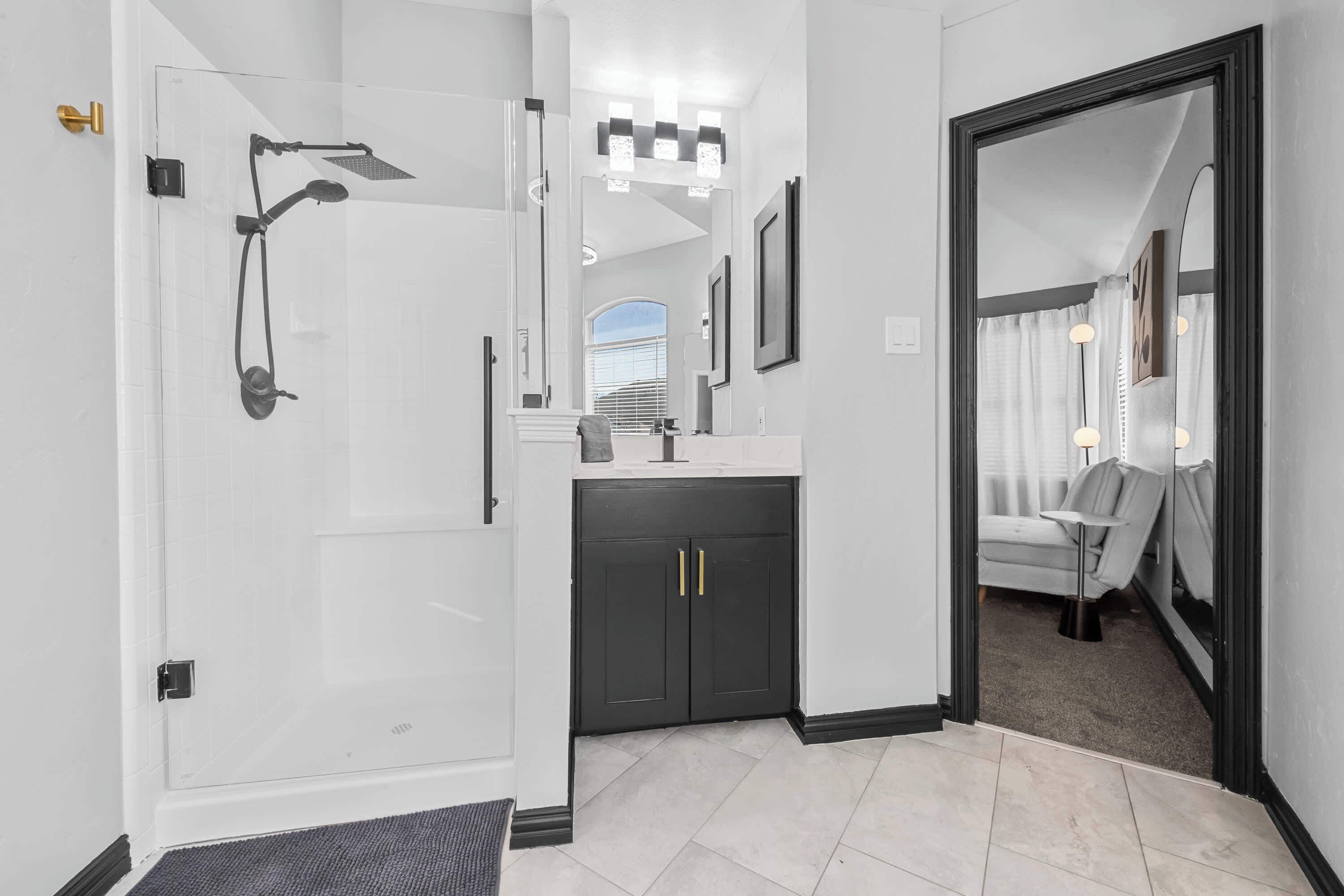 Shower, hair dryer, towels, shampoo