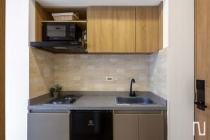 Microwave, stovetop, coffee/tea maker, electric kettle - NOK Stylish 1BR Apartment in Parque de la 93 (Bogotá)