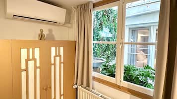 Luxe suite, 2 slaapkamers, niet-roken, patio | Verduisterende gordijnen, gratis wifi