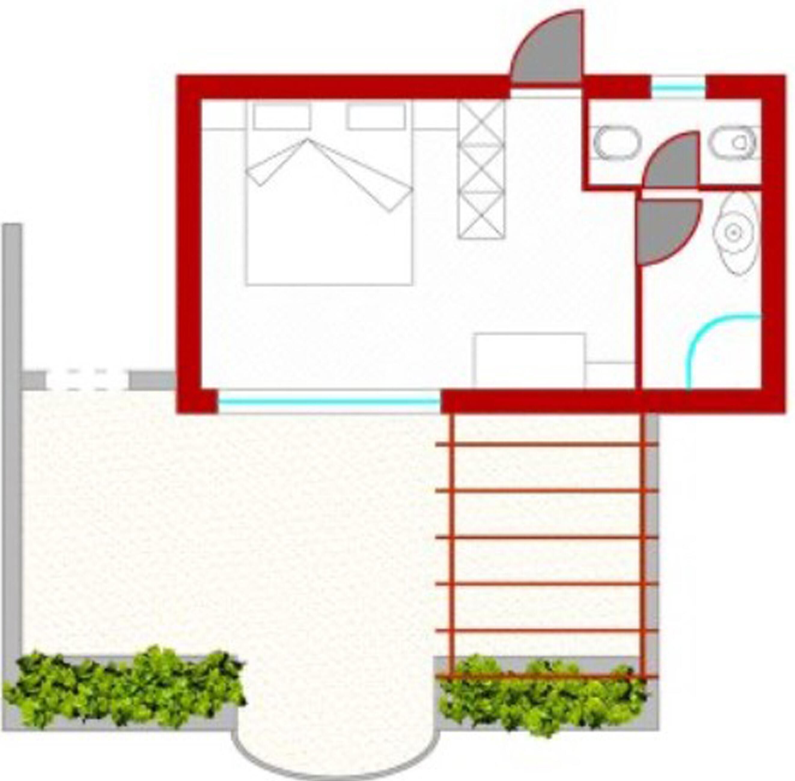 A floor plan with a kitchen, dining area, and two bedrooms.