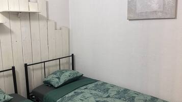 2 habitaciones y ropa de cama