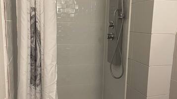 Shower, towels, toilet paper