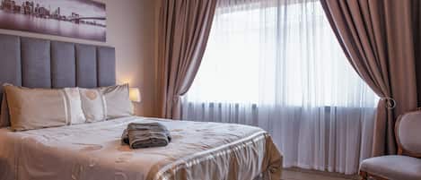 Appartement Deluxe, 1 grand lit, cuisine | Espace de travail pour ordinateurs portables, accĂšs au Wi-Fi (inclus)