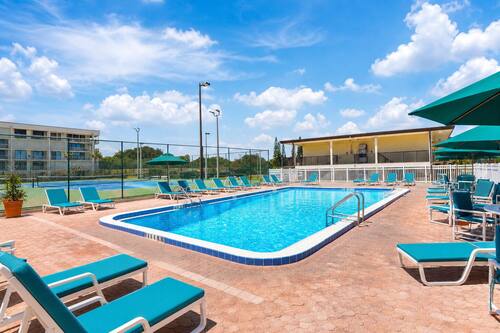 2 outdoor pools, open 9:00 AM to 10:00 PM, pool umbrellas, pool loungers