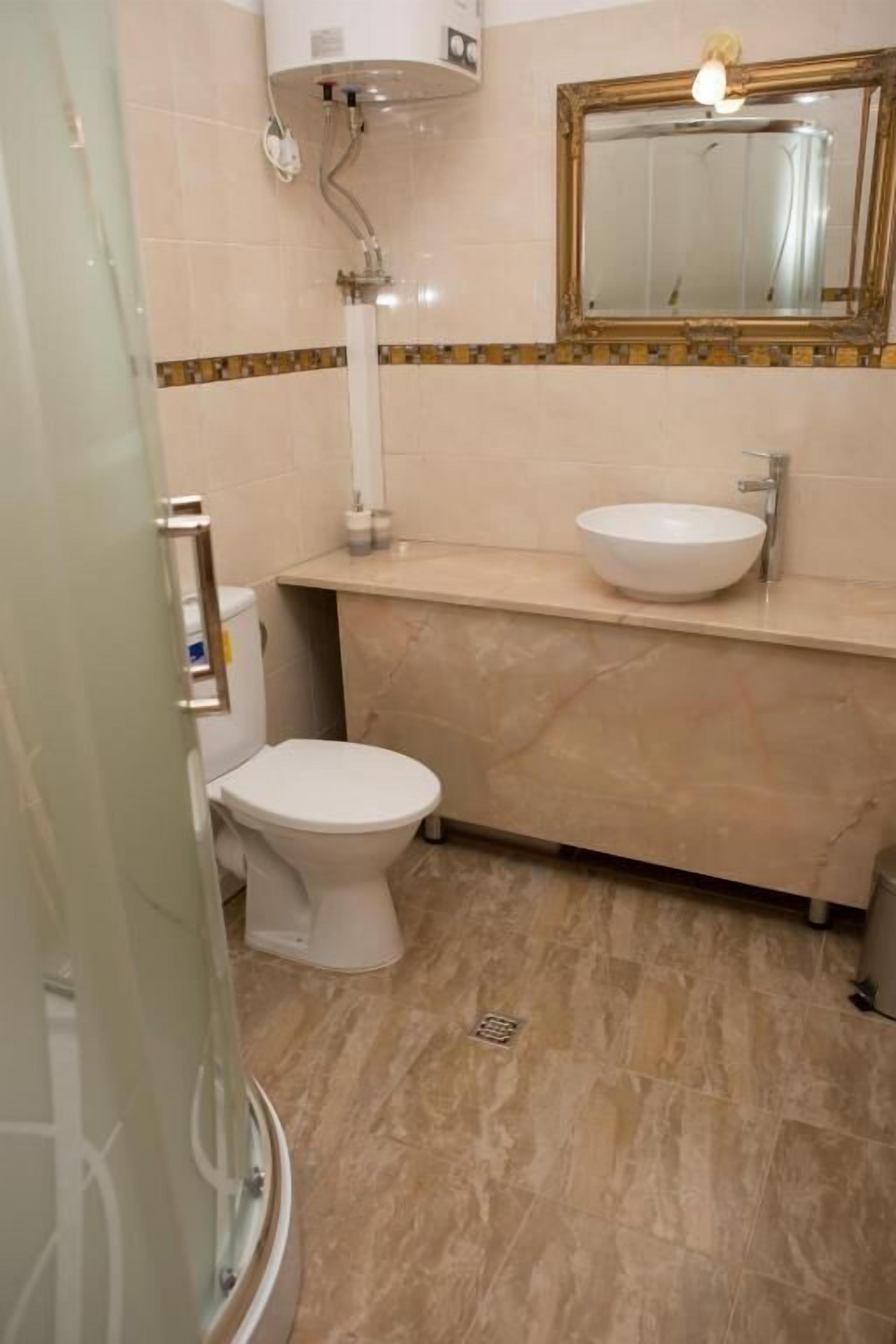Family Double Room, City View | Bathroom | Combined shower/tub, towels, soap