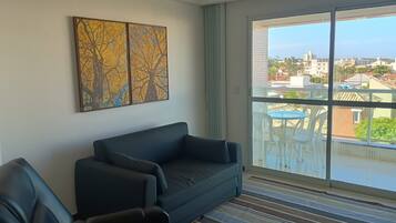 Basic Apartment | Living area | 32-inch Smart TV with digital channels