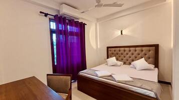 Deluxe Double Room, 1 King Bed, Balcony, Garden View | In-room safe, desk, laptop workspace, iron/ironing board
