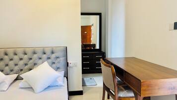 In-room safe, desk, laptop workspace, iron/ironing board