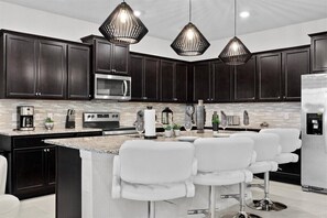 Fridge, microwave, oven, stovetop - Last Minute Disney! Private Pool, Hot Tub, Game Room & Themed Bedrooms. Book Now! #WIR441 (Orlando)