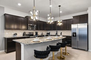 Fridge, microwave, oven, stovetop - Last Minute Disney! Private Pool, Hot Tub, Game Room & Themed Bedrooms. Book Now! #WIR439 (Orlando)