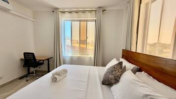 1 habitación, tabla de planchar con plancha, wifi gratis y ropa de cama