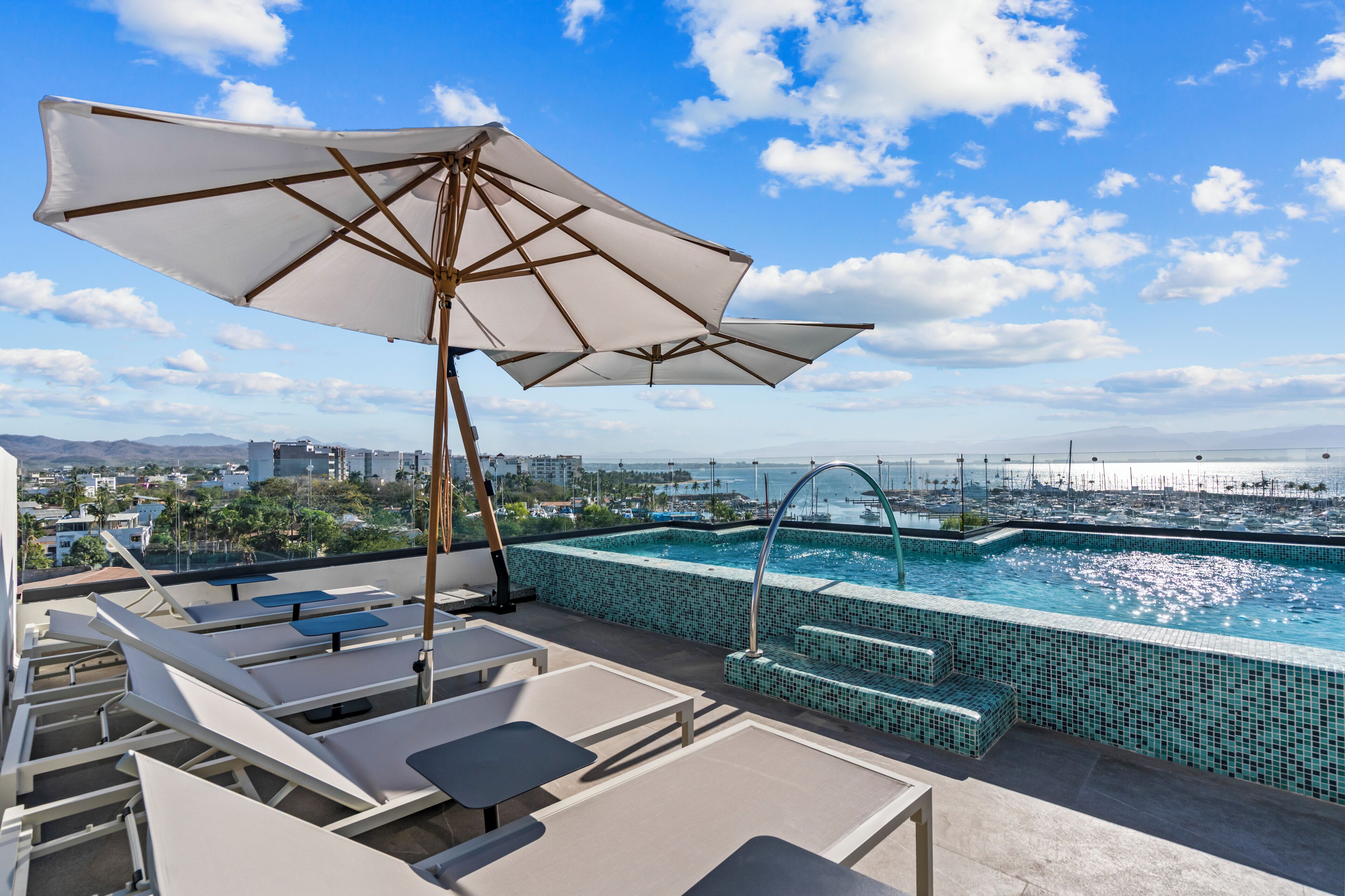 Outdoor pool, open 8:00 AM to 10:00 PM, pool umbrellas, pool loungers