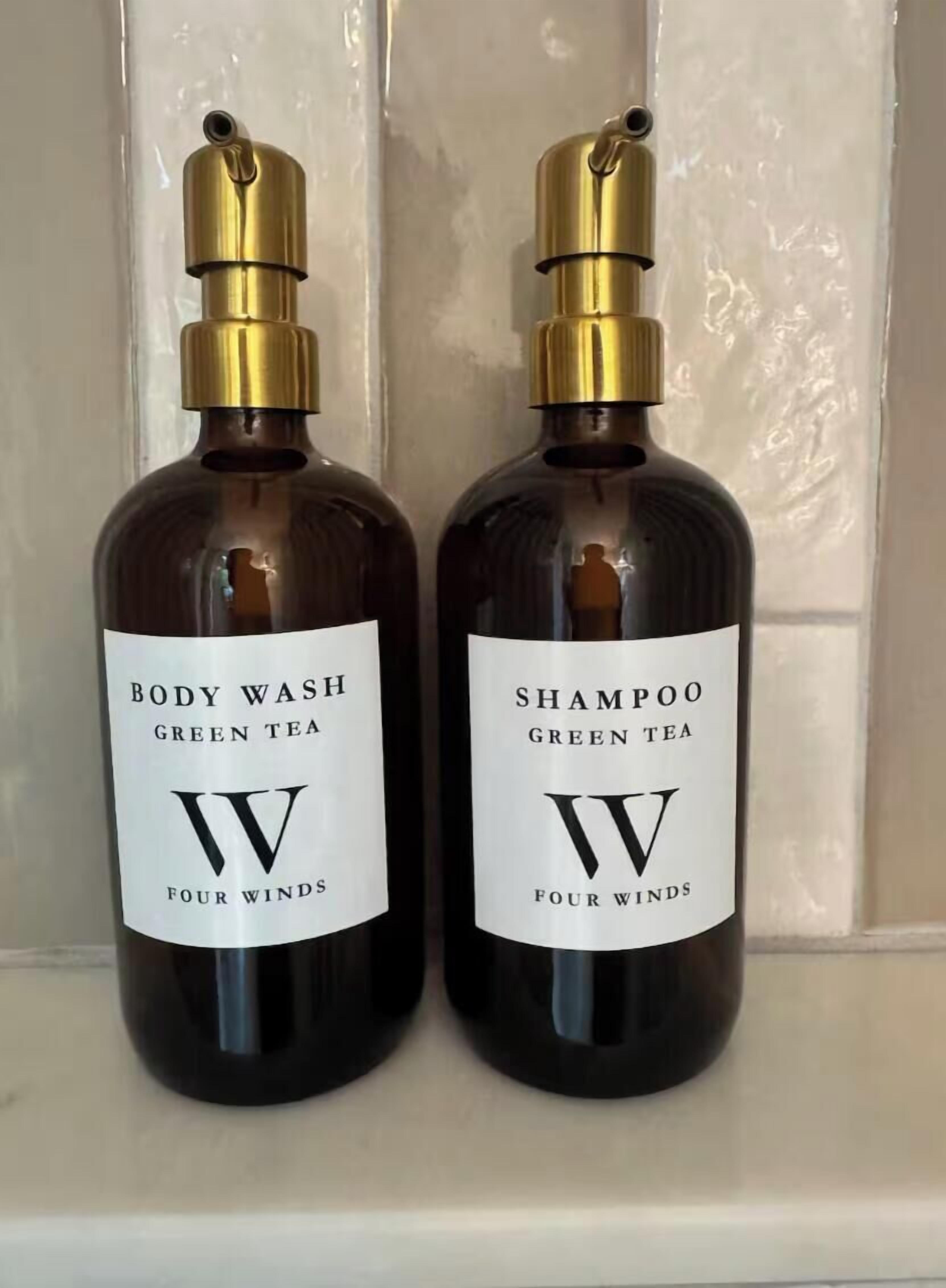 Two bottles of green tea body wash and shampoo by Four Winds.