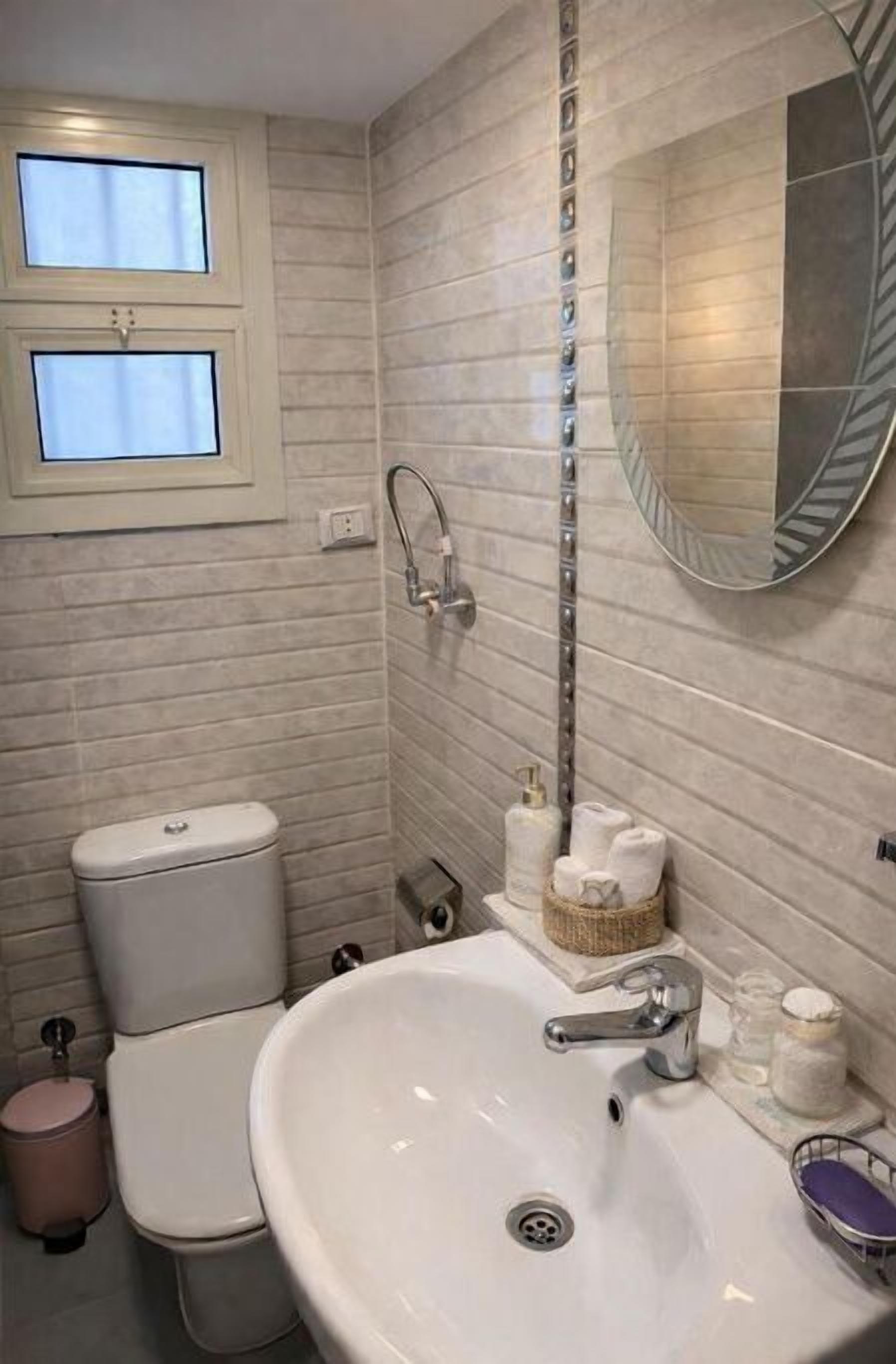 Shower, towels, soap, toilet paper