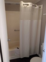 Standard Double Room | Bathroom | Combined shower/tub, towels, soap, shampoo