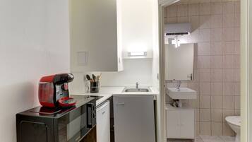 Fridge, microwave, coffee/tea maker, toaster