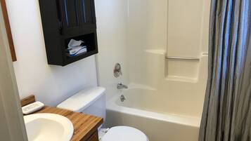 Hair dryer, towels, soap, toilet paper