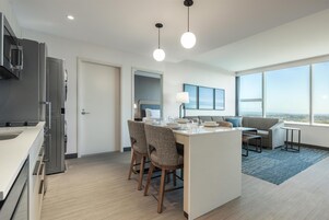 Suite, 1 Bedroom, 1 King Bed (Washer/Dryer) | Living area | 55-inch Smart TV with cable channels, Netflix, streaming services