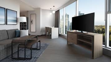 Suite, 1 Bedroom, Corner (Washer/Dryer) | Living area | 55-inch Smart TV with cable channels, Netflix, streaming services