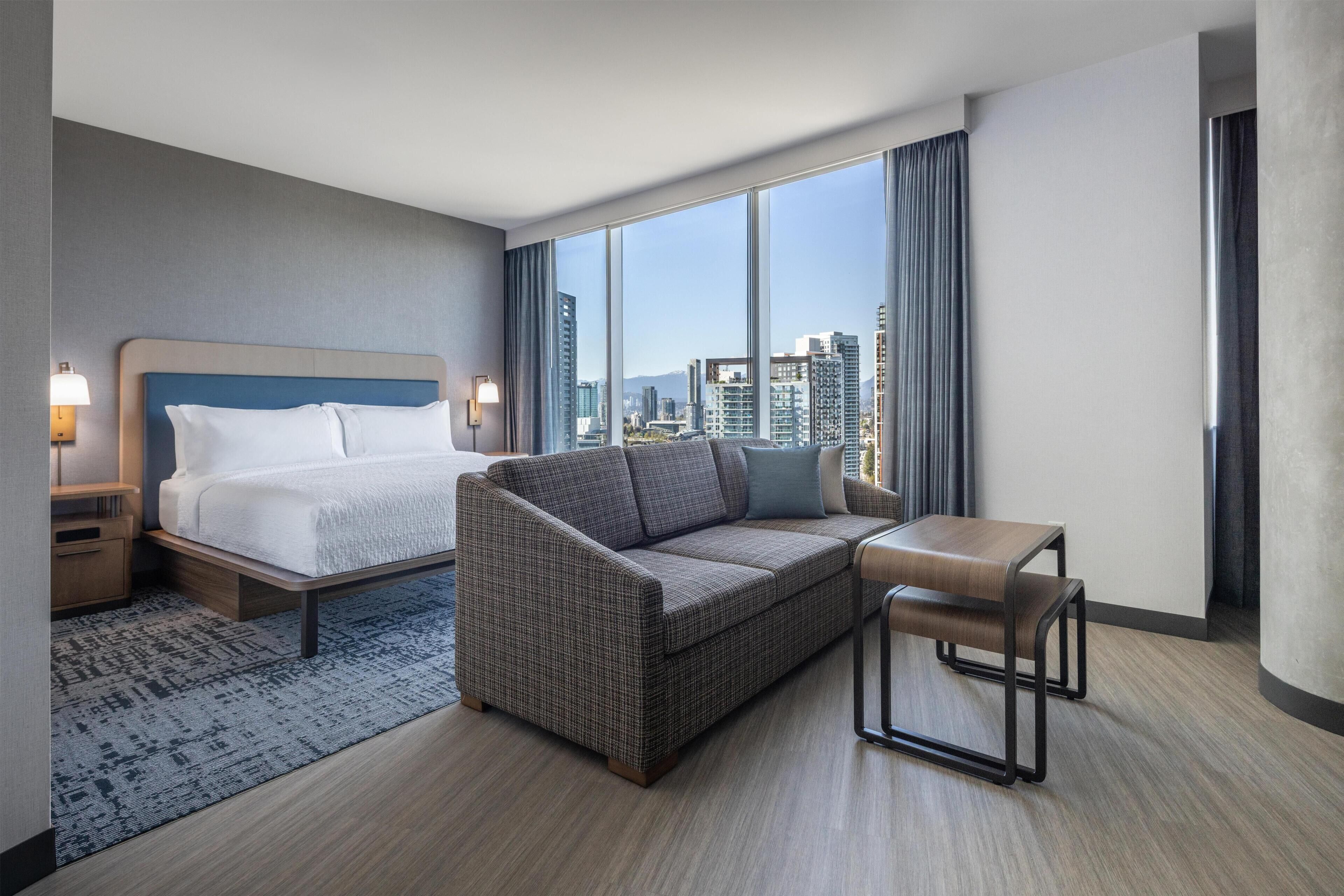 Studio, 1 King Bed | Living area | 55-inch Smart TV with cable channels, Netflix, streaming services