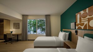 A hotel room with two beds, a desk, a chair, and a large window with a view of trees. - Spark By Hilton Bengaluru Marathahalli Outer Ring Road (Bengaluru)
