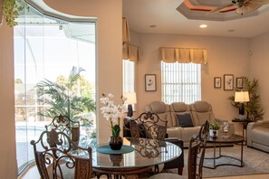 TV, fireplace - Canalfront Pool Home with Private Dock (Palm Coast)