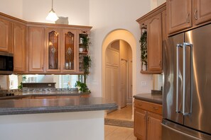 Fridge, microwave, oven, stovetop - Canalfront Pool Home with Private Dock (Palm Coast)