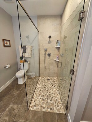 Shower, hair dryer, towels, soap