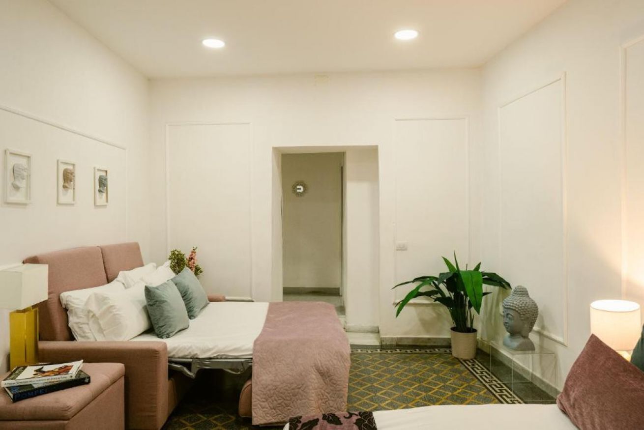 1 soverom og strykejern/-brett