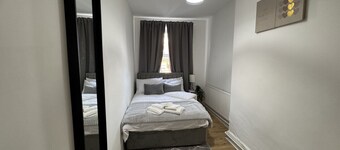 Charity Suite | Modern 1BR • Sleeps 4 • Wi-Fi